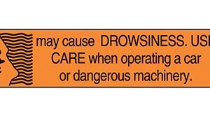 Pre-Printed Label Indeed Auxiliary Label Orange Paper May Cause Drowsiness. Use Care When Operating A Car Or Dangerous Machinery Black Safety and Instructional 3/8 X 1-5/8 Inch