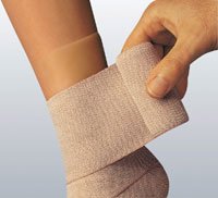 Compression Bandage Comprilan 4 Inch X 11 Yard Clip Detached Closure Tan NonSterile Standard Compression