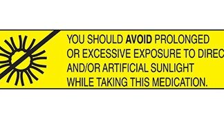 Pre-Printed Label Indeed Auxiliary Label Yellow Paper You Should Avoid Prolonged Or Excessive Exposure To Direct And/Or Artificial Sunlight While Taking This Medication Black Safety and Instructional 3/8 X 1-5/8 Inch