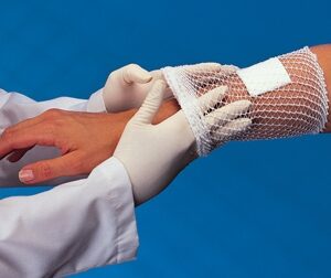 Elastic Net Retainer Dressing Surgilast Tubular Elastic 10 Yard Size 3 White Medium Hand / Arm / Leg / Foot NonSterile